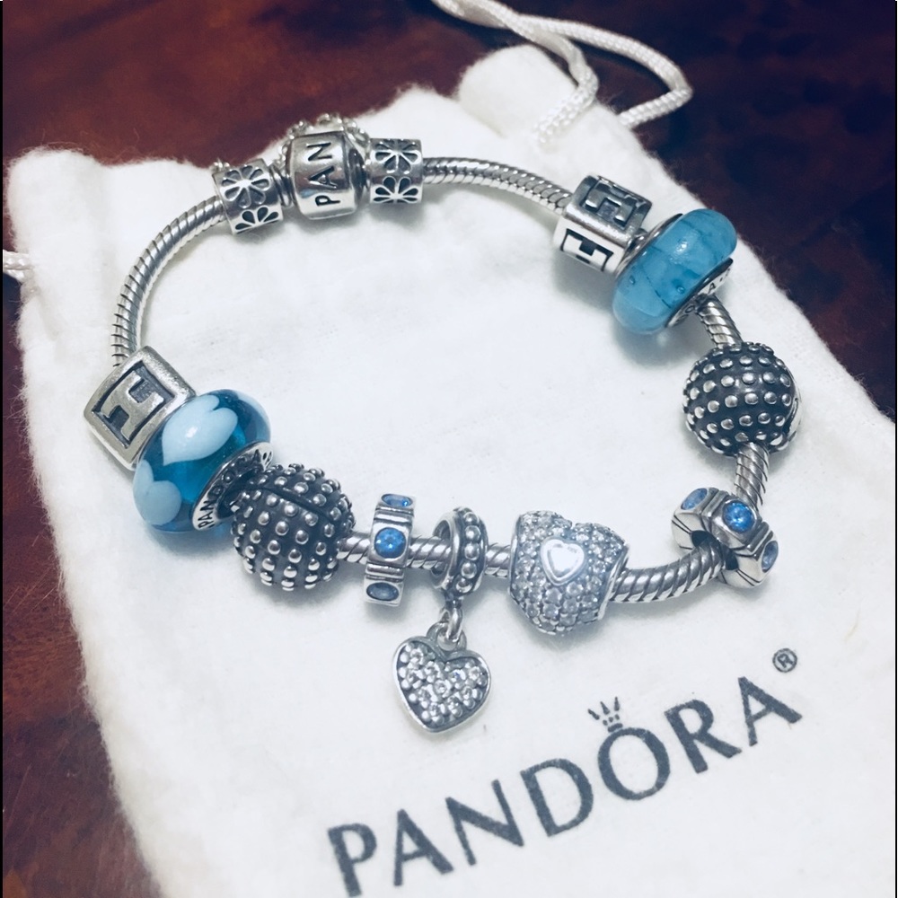 100% Authentic Pandora bracelet. Total 12peace